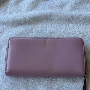 kate spade Leather Zip-Around Wallet in Mauve Pink with Gold Logo